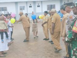 PLH DANRAMIL 1703-01/ENAROTALI DAMPINGI BUPATI PANIAI HADIRI KEGIATAN LAUNCHING PEMERIKSAAN KESEHATAN GRATIS (PKG) DI PUSKESMAS ENAEOTALI